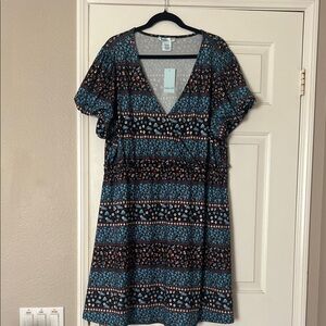 Plus size dress size 2X by Heather B. Very cute flowery print. Elastic waist.